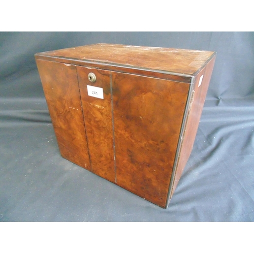 241 - Walnut table top humidor cabinet having two doors opening to reveal three drawers with brass handles... 