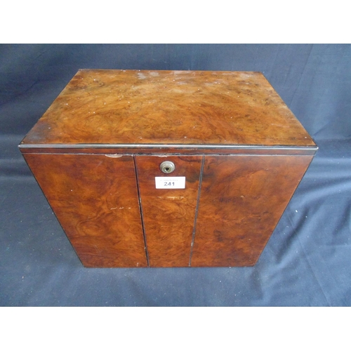 241 - Walnut table top humidor cabinet having two doors opening to reveal three drawers with brass handles... 