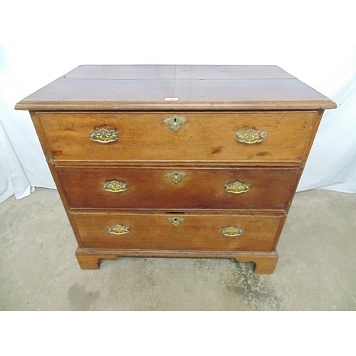 536 - 19th century oak chest of three long drawers, standing on bracket feet - 37.75