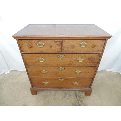 538 - 19th century oak chest of two short and three long drawers, standing on bracket feet - 36.25