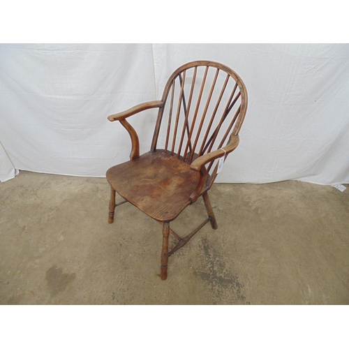 539 - 19th century elm stick back Windsor chair standing on turned stretchered legs