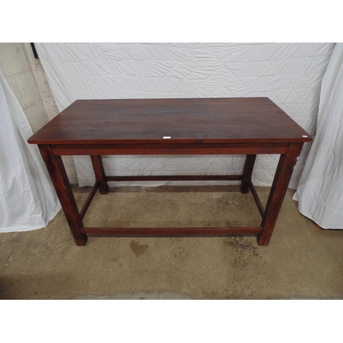 540 - Tall side table having rectangular top supported on chamfered square moulded stretchered legs, one l... 