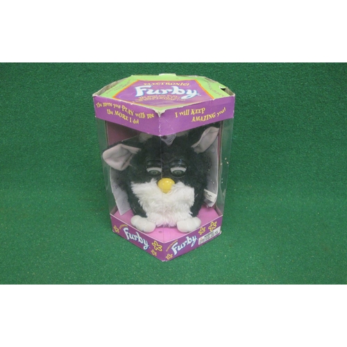 24 - 1998 Skunk Furby made by Tiger Electronics with instruction manual and Furbish-English Dictionary, c... 