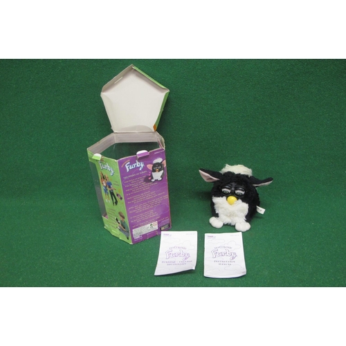 24 - 1998 Skunk Furby made by Tiger Electronics with instruction manual and Furbish-English Dictionary, c... 