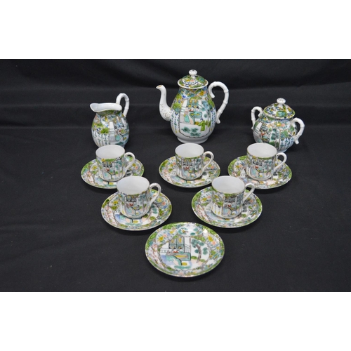 31 - 20th century part tea set decorated with scenes of figures to comprise: teapot, milk jug, lidded sug... 