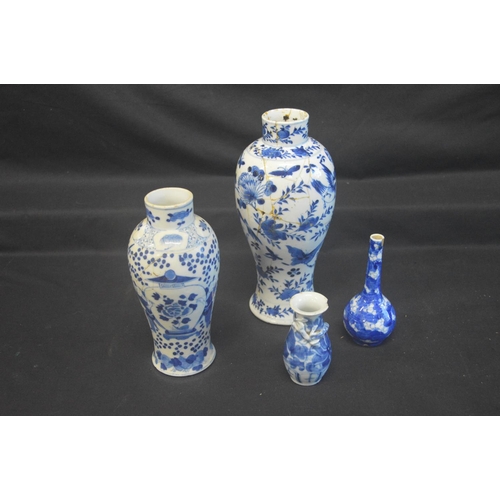 34 - Four Oriental blue & white decorated vases, the taller two having four character backstamps - talles... 