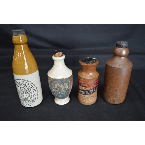 39 - Two stoneware hot water bottles together with two warming plates and six various bottles