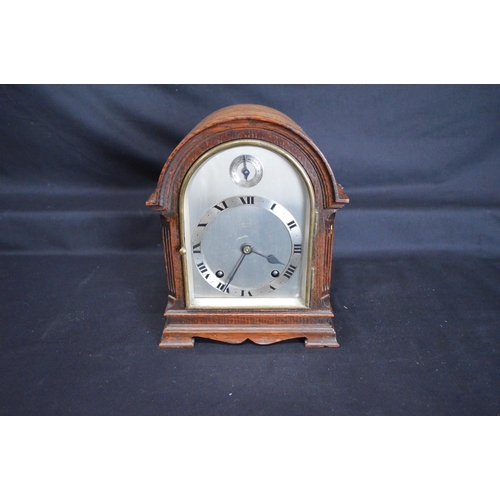 41 - Lawson & Son oak cased mantel clock having silvered dial with Roman Numerals and black hands - 8.5