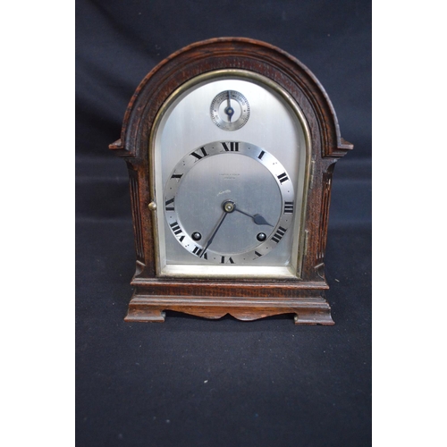 41 - Lawson & Son oak cased mantel clock having silvered dial with Roman Numerals and black hands - 8.5