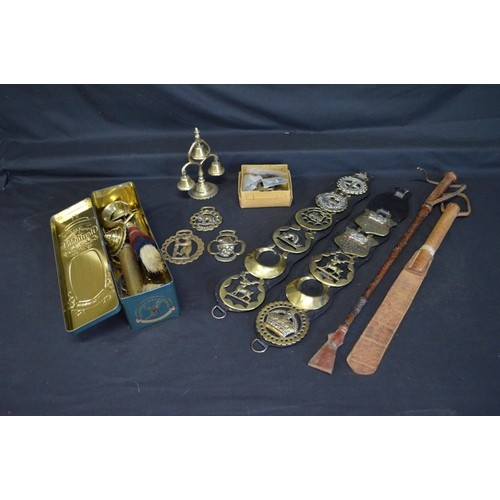 42 - Quantity of horse brasses together with brass bell turrets, brass whip sockets and leather riding cr... 