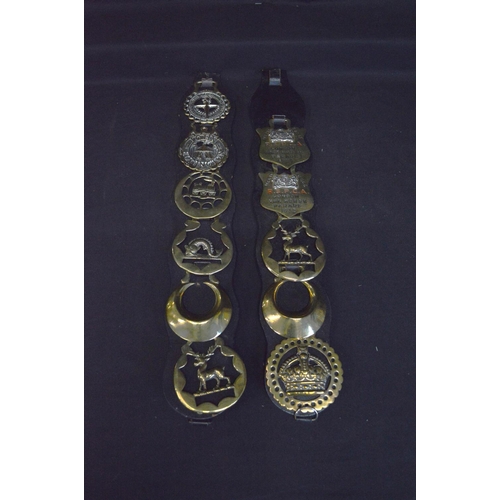 42 - Quantity of horse brasses together with brass bell turrets, brass whip sockets and leather riding cr... 