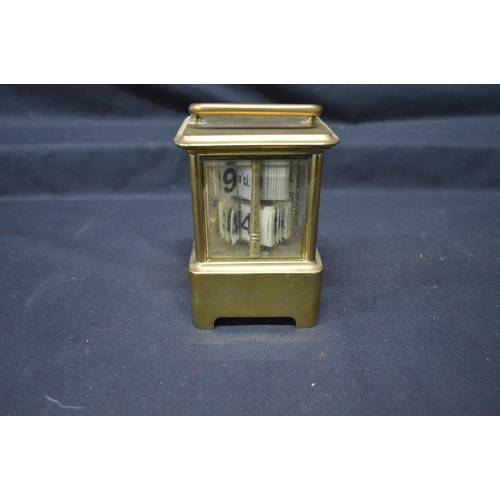 44 - Unusual brass carriage clock with four bevelled glass panels and top carrying handle - 5