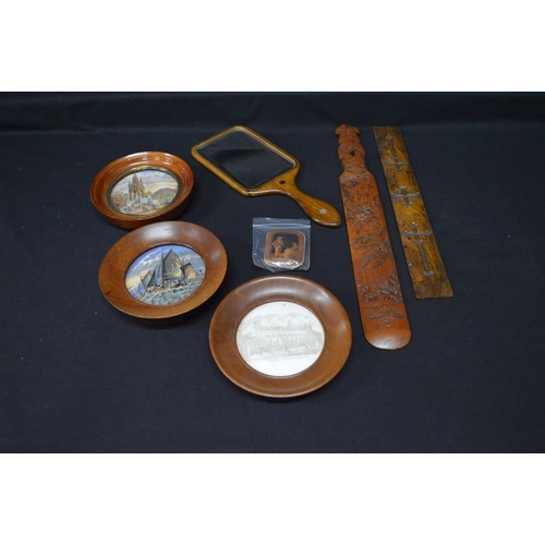 48 - Group of three framed pot lids together with bamboo page turner and needle cushion etc