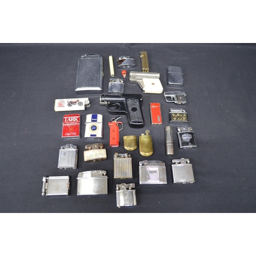 69 - Group of twenty six vintage and later pocket lighters to include: Imco, Mosda, Ronson, Colibri and B... 