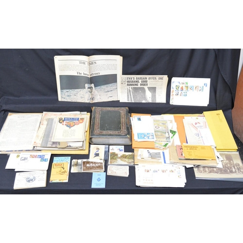 73 - Box containing a quantity of ephemera to include: postcards, photographs, First Day Covers and photo... 