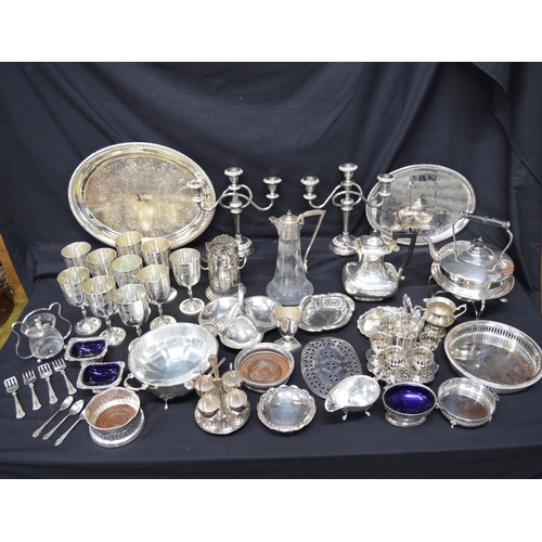 182 - Collection of silver plate to include: Harrods spirit kettle, set of ten goblets and bottle coaster ... 