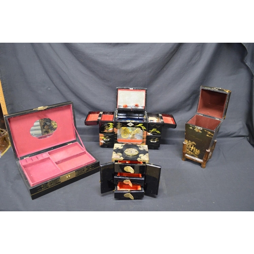 186 - Late 20th century lacquered jewellery box together with two other Oriental style jewellery boxes and... 