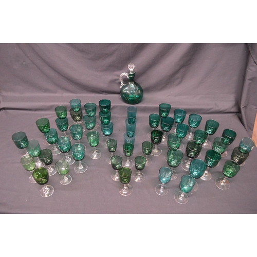 193 - Collection of forty eight Georgian Green wine glasses having green bowls on clear stems and circular... 