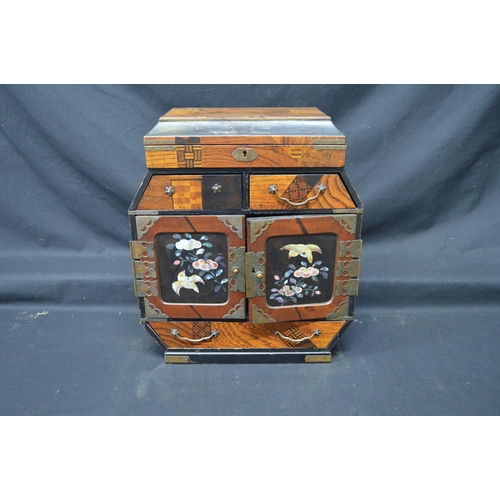197 - 20th century lacquered and marquetry Japanese table top cabinet having lift top over two drawers and... 