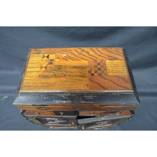 197 - 20th century lacquered and marquetry Japanese table top cabinet having lift top over two drawers and... 