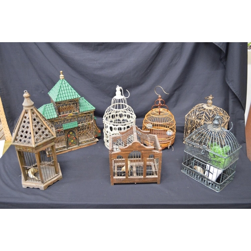 206 - Group of seven small ornamental birdcages of various shaped and styles