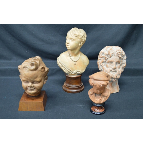 217 - Group of four earthenware busts to include: 1949 Betty Hendrick bust of a toddler - tallest 11.6