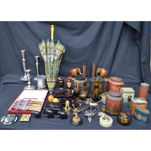 219 - Collection of sundry items to include: quantity of vintage tins, parasol and elephant bookends etc
