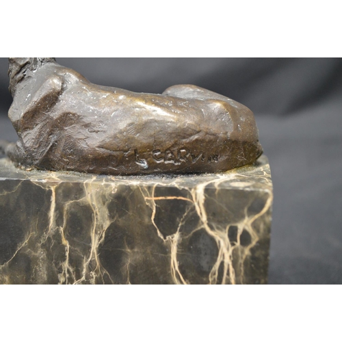 220 - After L Carvin, bronze figure of a recumbent stag on veined marble base, incised name to verso - 7.2... 