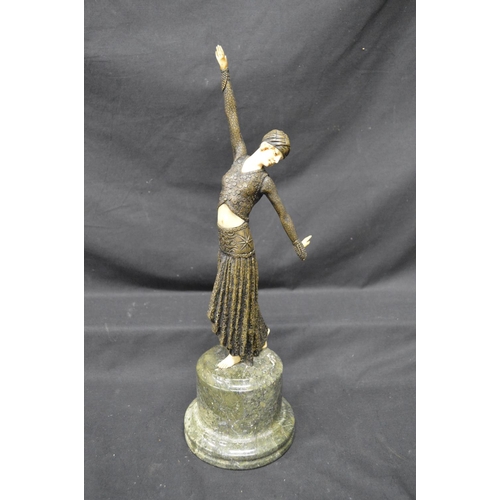 224 - Late 20th century resin Art Deco figure of dancing lady standing on circular marble base - 15.75