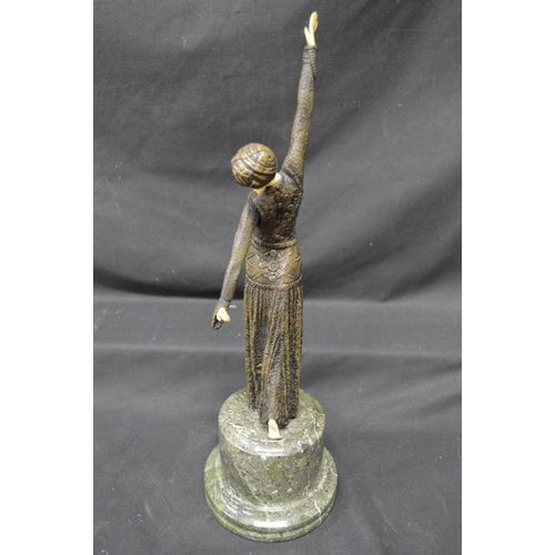 224 - Late 20th century resin Art Deco figure of dancing lady standing on circular marble base - 15.75