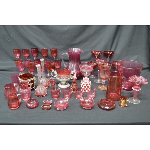 227 - Collection of Victorian and later Cranberry glassware to include: wine glasses, scent bottles, jugs,... 