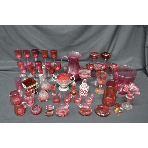 227 - Collection of Victorian and later Cranberry glassware to include: wine glasses, scent bottles, jugs,... 