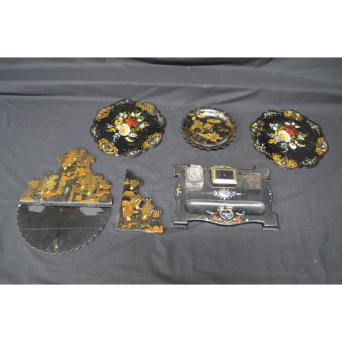 204 - Group of 19th/20th century lacquered papier mache items to include: double inkwell stand, folding sh... 
