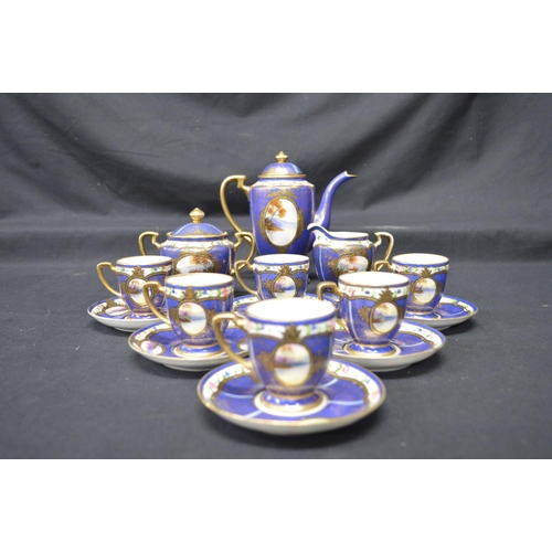 244 - Noritake teaset having blue ground decorated with scenic panels and gilt highlights to comprise: tea... 