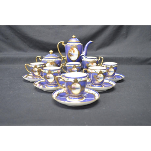244 - Noritake teaset having blue ground decorated with scenic panels and gilt highlights to comprise: tea... 