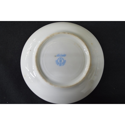 244 - Noritake teaset having blue ground decorated with scenic panels and gilt highlights to comprise: tea... 