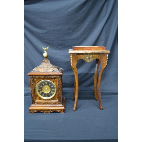 256 - Oak carved mantel clock by Bennett Bros. having black chapter ring with gilt Roman Numerals and gilt... 