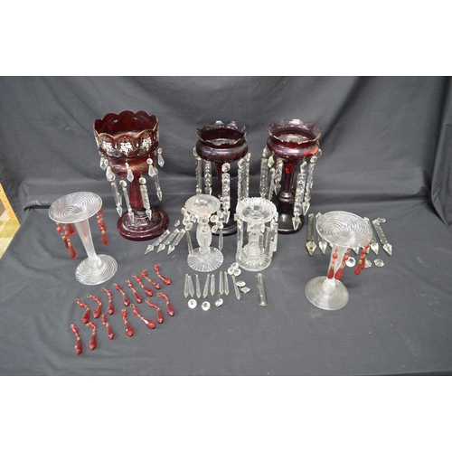 262 - Group of seven various Ruby Red and clear glass table lustres together with three green table lustre... 
