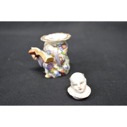 267 - Sampson (?) inkwell in the form of a choir boy in floral robe, impressed S on base - 3.25