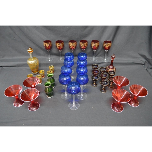 269 - Collection of coloured glassware to comprise: set of six red cocktail glasses, set of blue wine glas... 