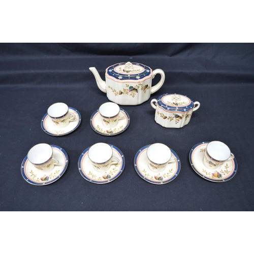 273 - GD&C porcelain teaset having floral decoration on a cream ground and comprising: teapot, sugar bowl,... 