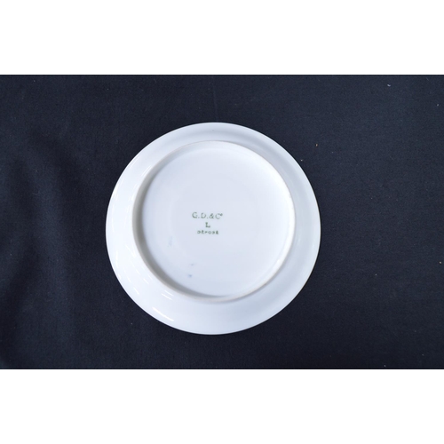 273 - GD&C porcelain teaset having floral decoration on a cream ground and comprising: teapot, sugar bowl,... 