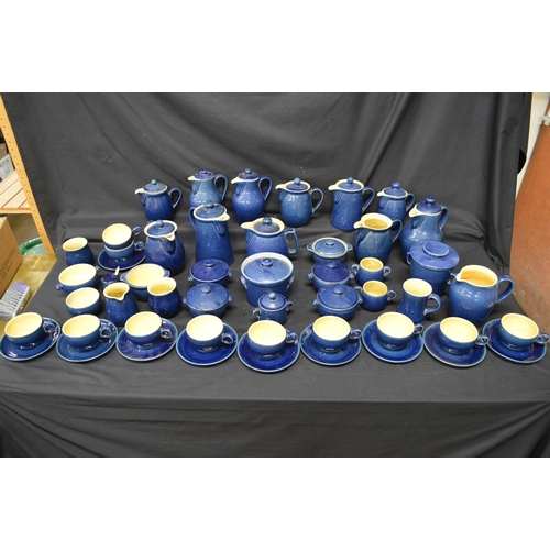 275 - Collection of fifty one pieces of Denby Blue cottage table ware to include: tea cups, saucers, jugs ... 
