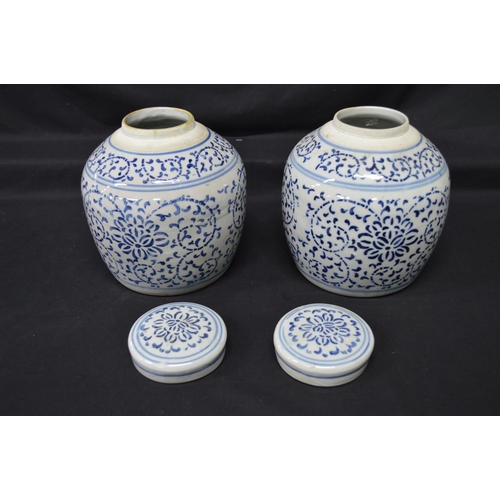 279 - Pair of 20th century Oriental ginger jars with blue pattern on white ground - 8.75