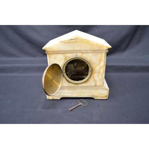 289 - Alabaster cased mantel clock of architectural form with alabaster dial and gilt Roman Numerals - 10.... 