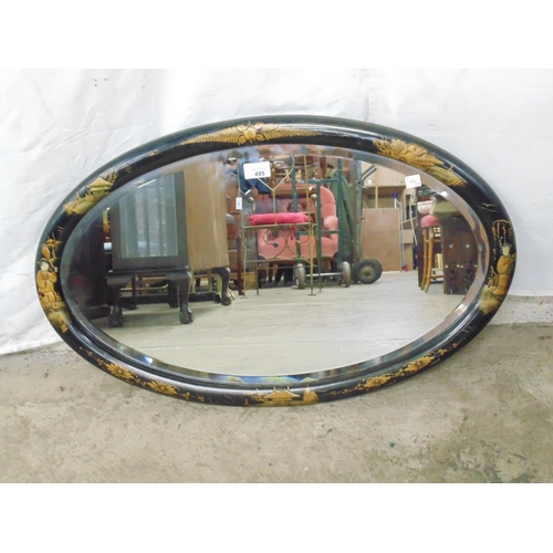 495 - Oval bevel edged chinoiserie framed wall mirror with painted and raised relief decoration of figures... 