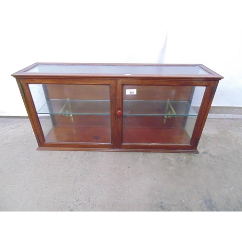 498 - Small mahogany glazed display cabinet having glazed top and sides with the two glazed doors opening ... 