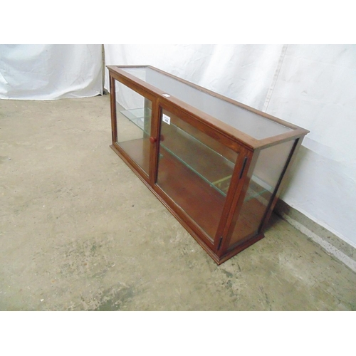 498 - Small mahogany glazed display cabinet having glazed top and sides with the two glazed doors opening ... 