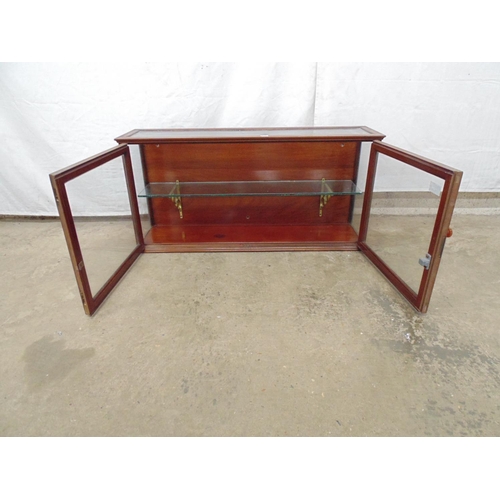 498 - Small mahogany glazed display cabinet having glazed top and sides with the two glazed doors opening ... 