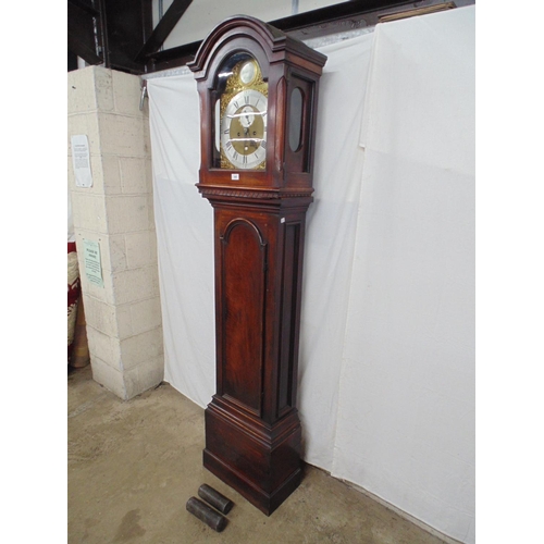 505 - James Smith Lynn, mahogany longcase clock having brass silvered arched dial with Roman Numerals and ... 